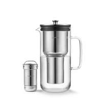 Aarke Water Purifier Jug in glass and stainless steel, shown with its refillable filter cartridge