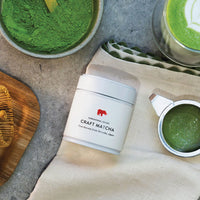 Kiss the Hippo Craft Matcha tin with traditional matcha preparation