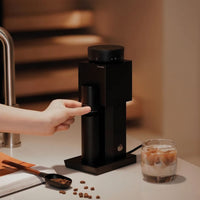 Timemore Bricks 01S compact single-dose electric grinder on kitchen counter — quiet brushless DC motor