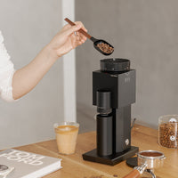 Timemore Bricks 01S compact single-dose grinder footprint — smaller than a paperback book