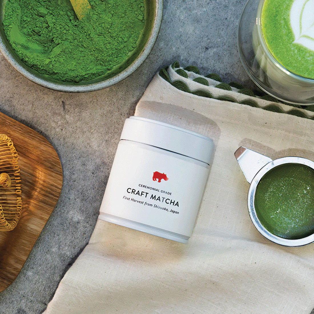 Kiss the Hippo Craft Matcha tin with traditional matcha preparation