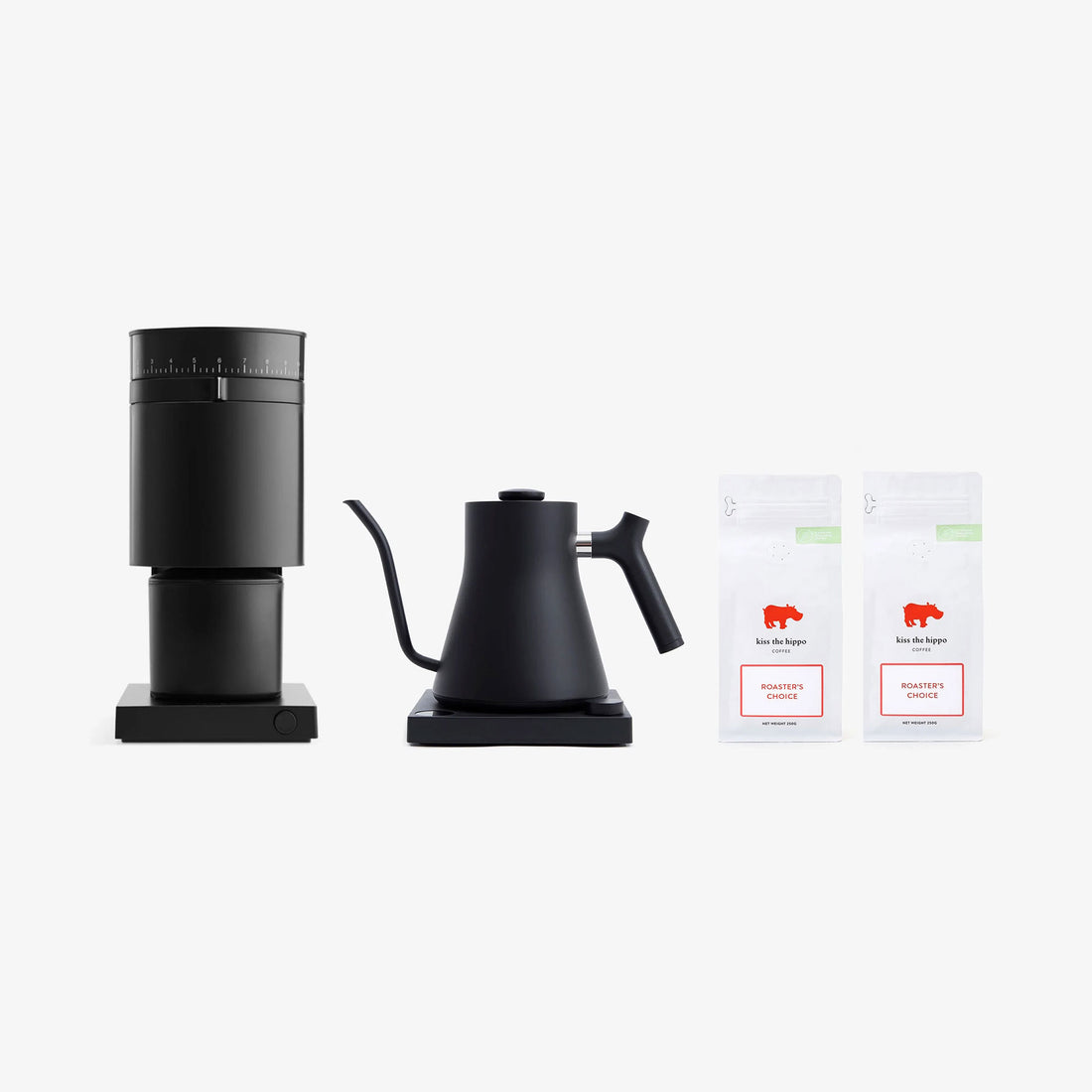 Fellow Black coffee maker and kettle with two bags of coffee on a white background