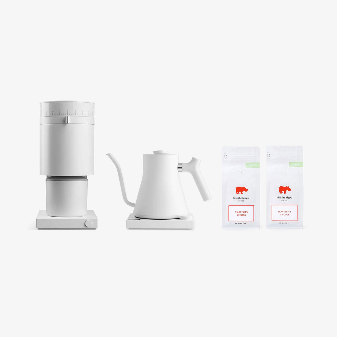 Fellow White coffee maker and kettle with two boxes of coffee on a white background