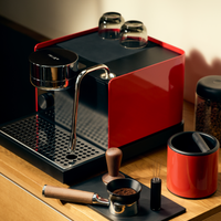 Fellow Espresso Series 1 Cherry Red on wooden counter
