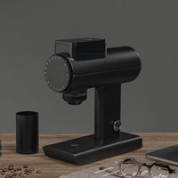 Timemore Sculptor coffee grinder in black with dosing cup, hero shot