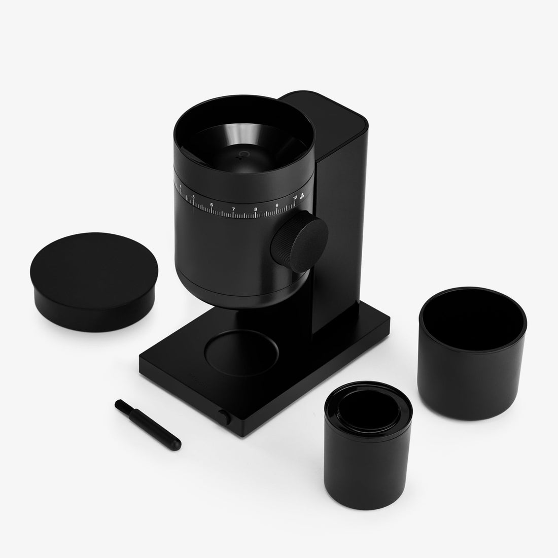 Fellow Opus 2 grinder in matte black with its catch cup, hopper lid and cleaning brush